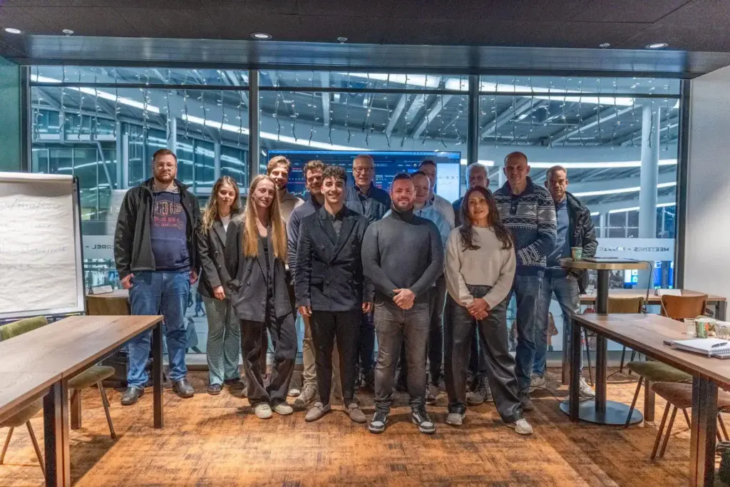 Groepsfoto van cliënten en het team tijdens een Swing Capital mastermind-dag